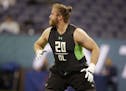 North Dakota State offensive lineman Joe Haeg runs a drill at the NFL football scouting combine in Friday, Feb. 26, 2016, in Indianapolis.