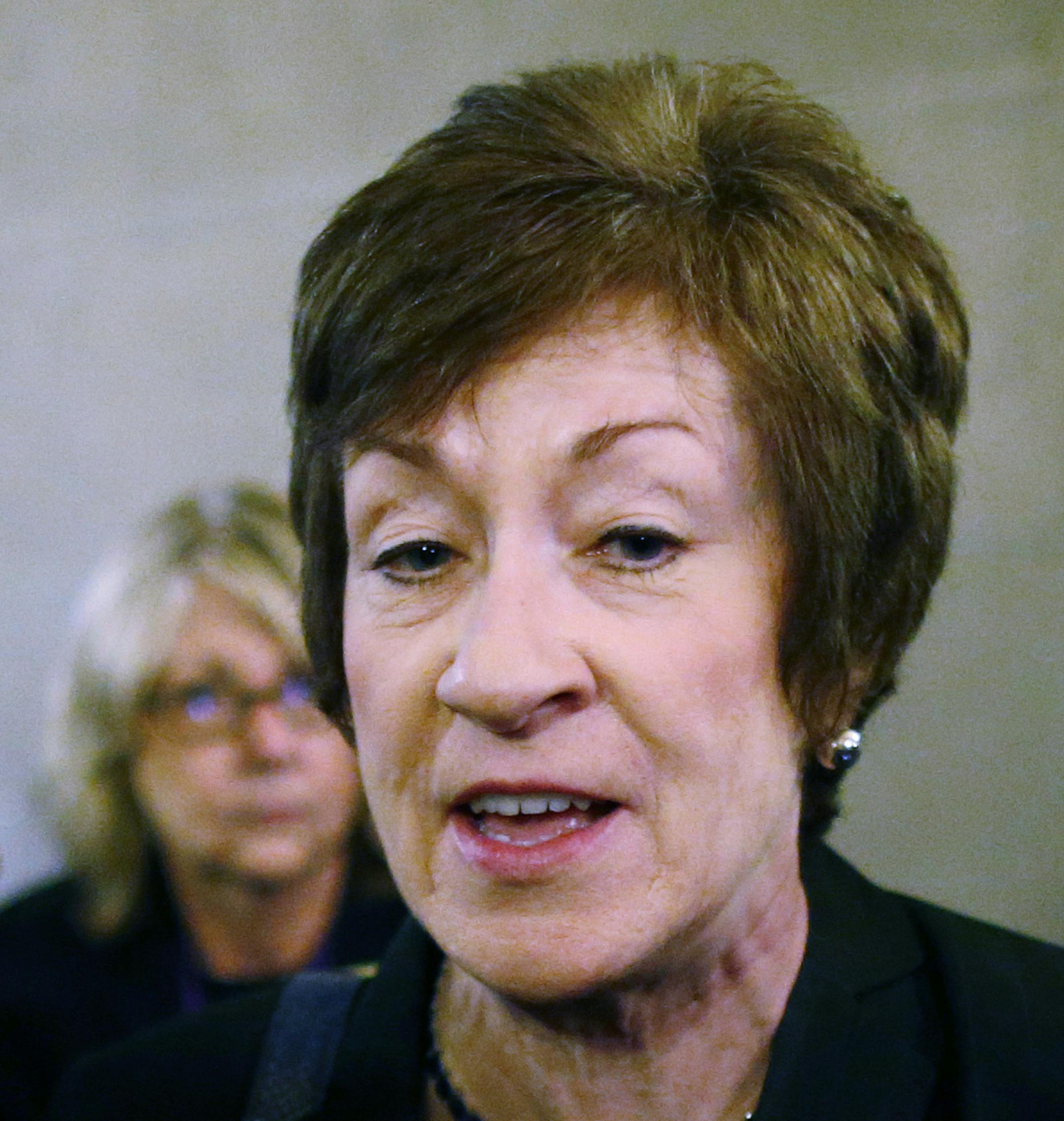 FILE - In this Oct. 12, 2013 file photo, Sen. Susan Collins, R-Maine speaks to reporters on Capitol Hill in Washington. Proponents of a bill that would prohibit employers from discriminating against workers on the basis of sexual orientation or gender identity are optimistic about the measureís prospects ahead of a crucial Senate vote. Nearly 20 years after a similar bill failed by one vote, Republicans and Democrats have joined forces on a bill critical to gay rights advocates. The broad s