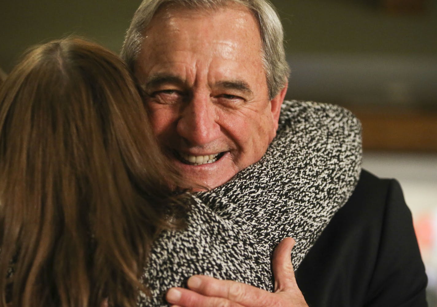 Democrat U.S. Rep. Rick Nolan hugs his sister Mary Pat.