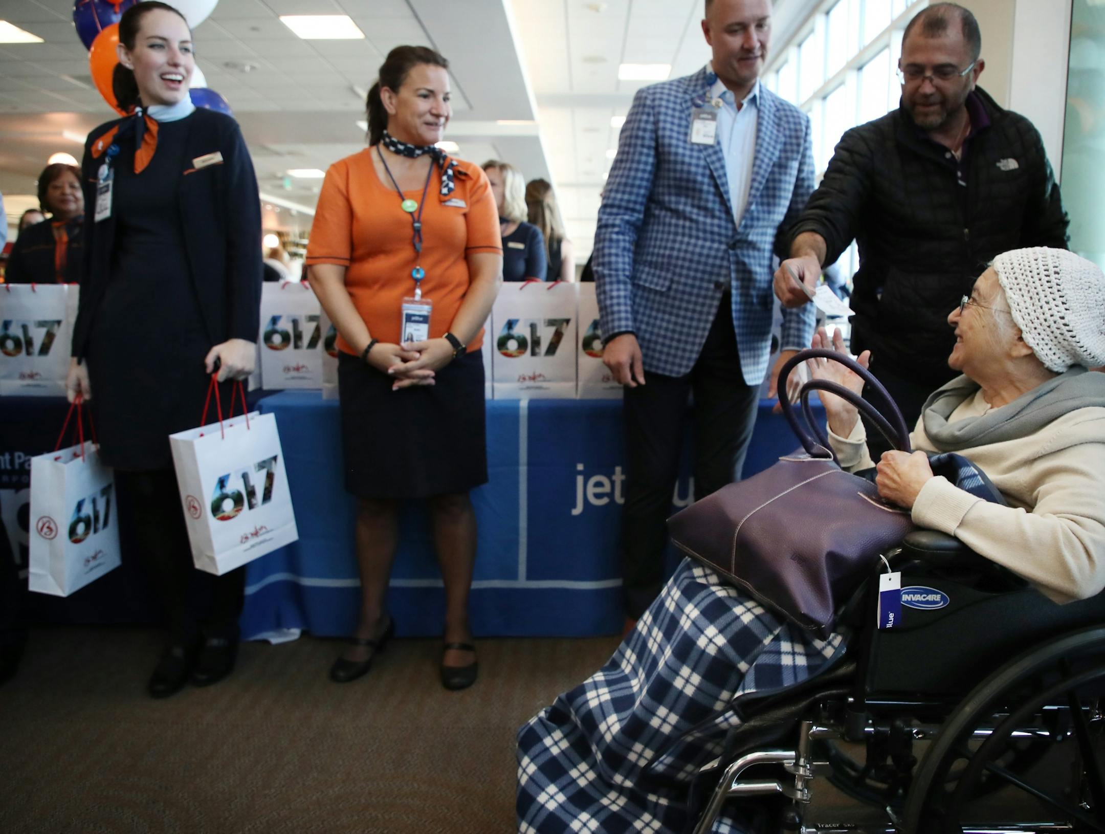 Mery Maruani 87, of St. Louis Park was the first passenger to board JetBlue flight 836 to Boston from at MSP Thursday May 3, 2018 Bloomington, MN.