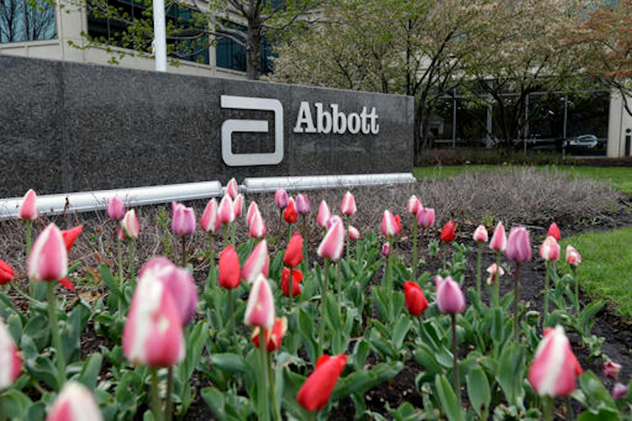 A sign at an Abbott Laboratories campus facility is seen in Lake Forest, Ill., on Thursday, April 28, 2016. Abbott Laboratories will buy St. Jude Medical Inc. in a cash-stock deal that aims to strengthen the medical device maker's share of the market for cardiovascular care. (AP Photo/Nam Y. Huh)
