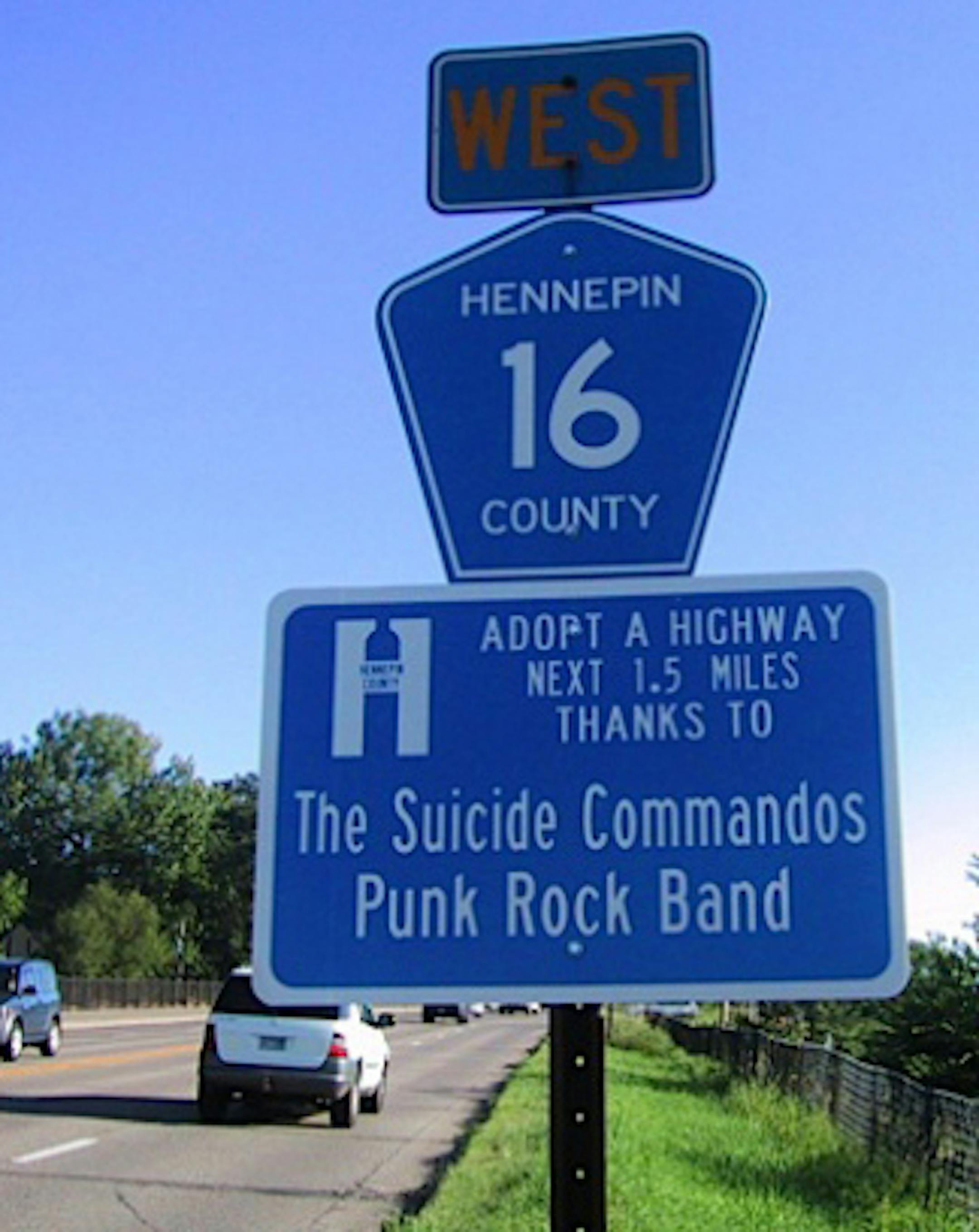 Adopt-a-Highway sign featuring Suicide Commandoes
