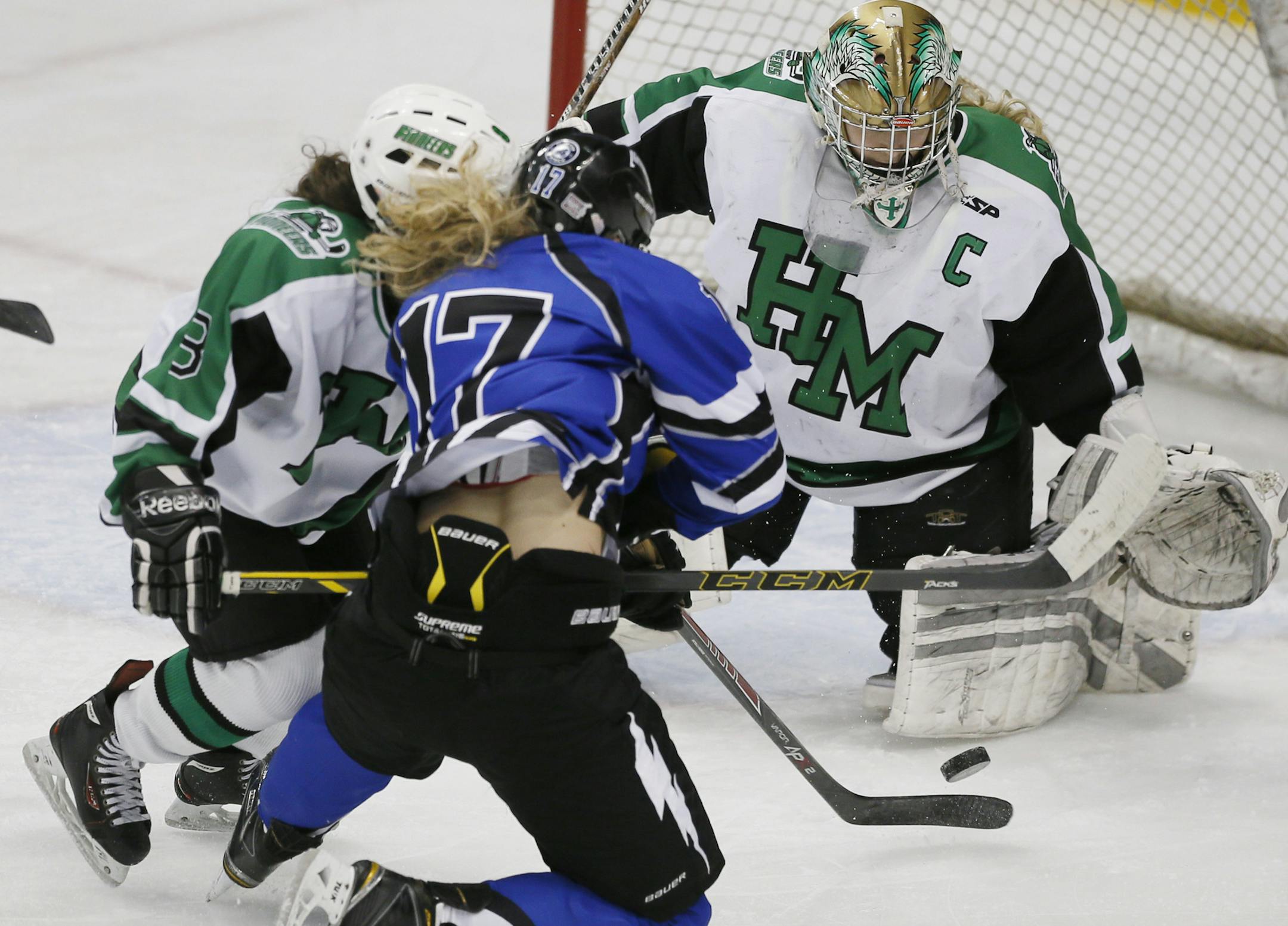 Hill Murray goal keeper Leah Patrick stopped a shot by Kati Quaintance in the first period.Hill-Murray played Eastview in Class 2A hockey quarterfinals at Xcel Energy Center Thursday February 19, 2015 in St. Paul, MN. ] Jerry Holt/ Jerry.Holt@Startribune.com