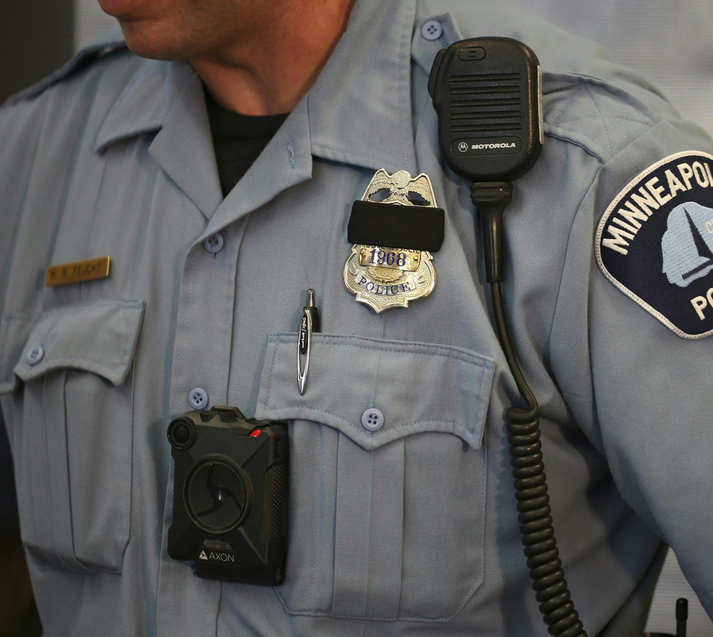 Minneapolis Police Officer Ken Feucht was one of the officers who volunteered for the body camera pilot program. He wore the Axon camera, made by Taser that will be used by the Minneapolis Police Department at the news conference at the First Precinct Police Headquarters Tuesday afternoon. ] JEFF WHEELER &#x2022; jeff.wheeler@startribune.com Mayor Betsy Hodges and Police Chief Jane Harteau announced at a news conference Tuesday afternoon, July 19, 2016 that Minneapolis Police Department's Body C