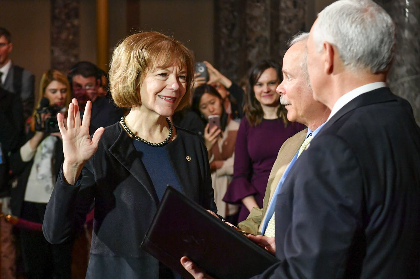 Senator Tina Smith was sworn in by Vice President Mike Pence.