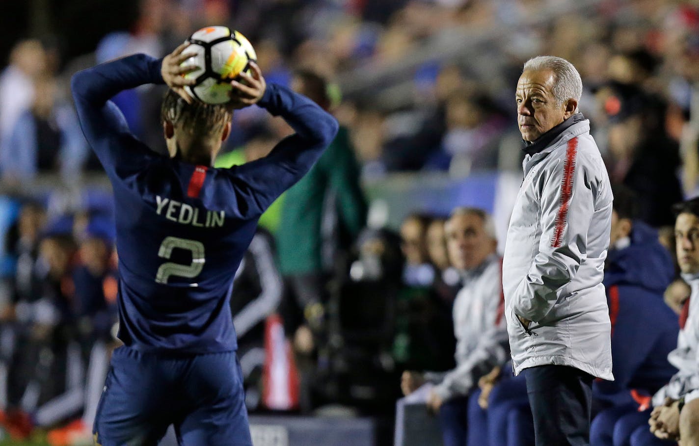 United States head coach Dave Sarachan watches DeAndre Yedlin (2) throw-in the ball during the second half of an international friendly soccer match against Paraguay