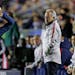 United States head coach Dave Sarachan watches DeAndre Yedlin (2) throw-in the ball during the second half of an international friendly soccer match a