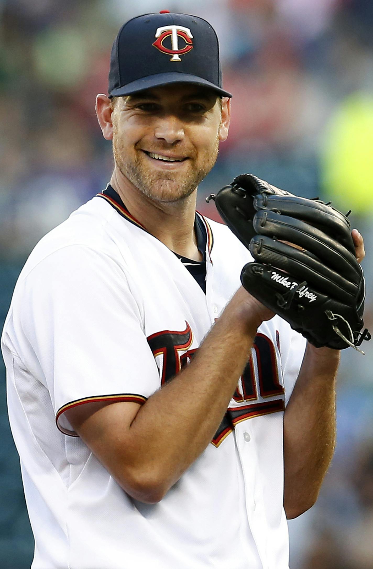 Minnesota Twins starting pitcher Mike Pelfrey (37) cracked a smile between pitches in the fourth inning. ] CARLOS GONZALEZ cgonzalez@startribune.com - June 23, 2015, Minneapolis, MN, Target Field, MLB, Minnesota Twins vs. Chicago White Sox