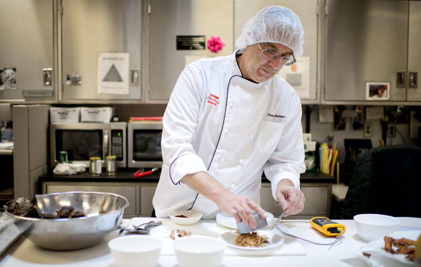 Thomas Dickens, Chef Services development leader at Hormel, shows some new products in the company's test kitchen at their headquarters on Sept. 15, 2015 in Austin, Minn. (Glenn Stubbe/Minneapolis Star Tribune/TNS) ORG XMIT: 1174314