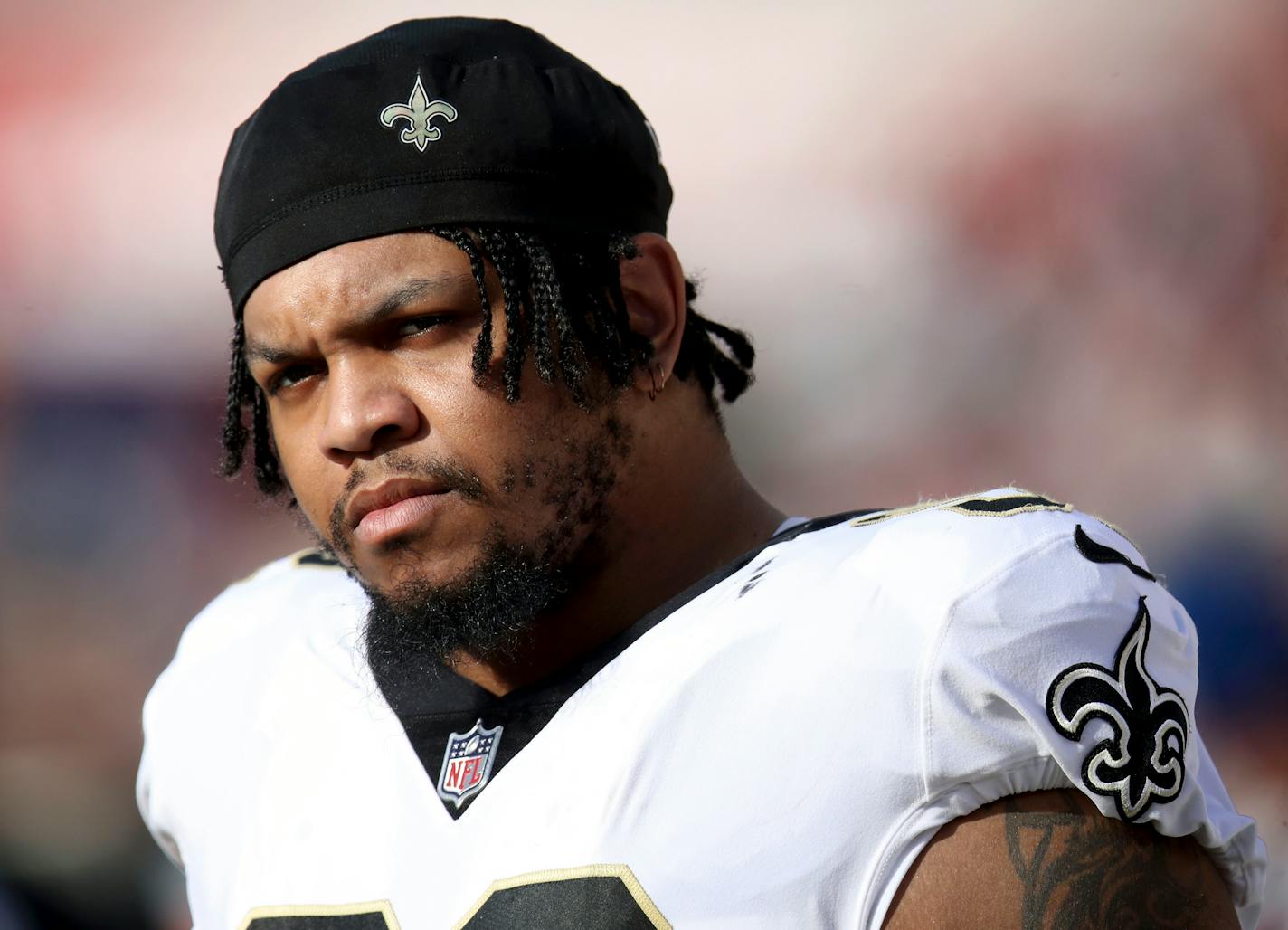 FILE - New Orleans Saints' Marcus Davenport stands on the sideline during an NFL football game against the San Francisco 49ers, Nov. 27, 2022, in Santa Clara, Calif. The Minnesota Vikings have ramped up their pass rush by agreeing to terms with former New Orleans defensive end Davenport. The deal was confirmed by a person with direct knowledge of the deal who spoke to The Associated Press on condition of anonymity because free agent contracts can't be finalized until the new league year begins on Wednesday, March 15, 2023. (AP Photo/Scot Tucker, File)