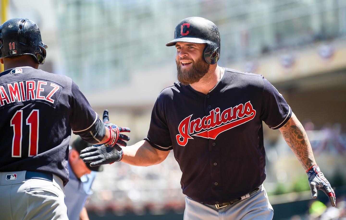 The Indians' Mike Napoli, right