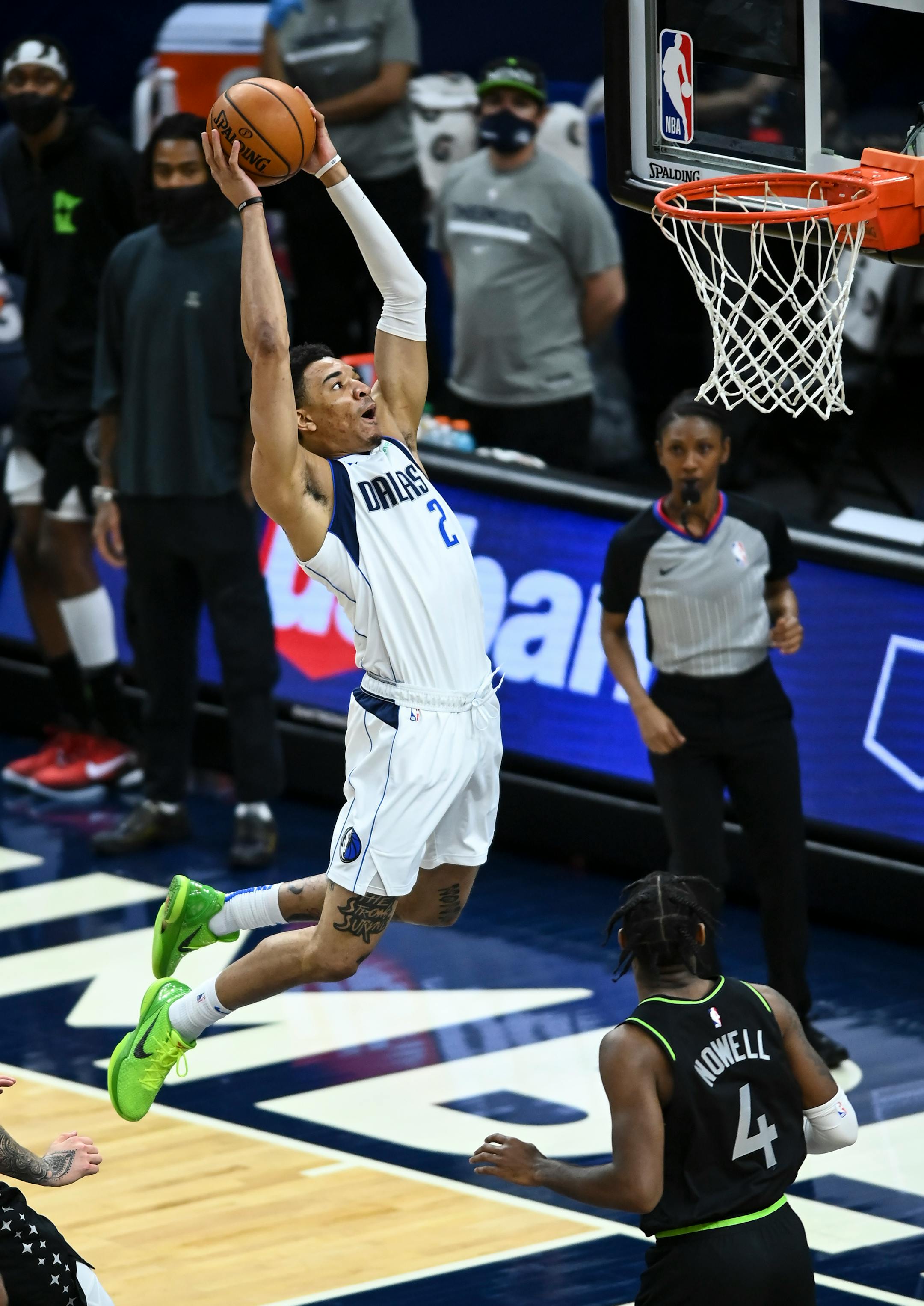Dallas Mavericks guard Tyler Bey (2) dunked the ball alte in the fourth quarter against the Minnesota Timberwolves.