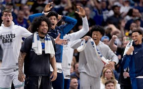 The Timberwolves bench reacted to a basket by Rudy Gobert in the fourth quarter of Game 7 on Sunday night.
