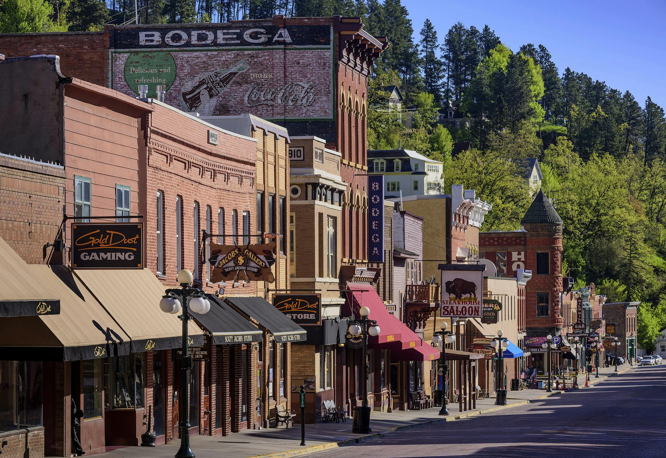 Historic Deadwood: Walk in the footsteps of historic Old West legends like Wild Bill Hickok, Calamity Jane and Seth Bullock. This 1870s gold rush town became a National Historic Landmark in 1961. Today, it teems with Black Hills entertainment and things to do including concerts, casinos, museums, historic sites, spas and parades. The race for gold raised a mountain town to its feet for a colorful traipse through history. Grit, determination, and legendary characters, entrenched this landmark cit