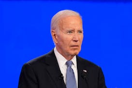 President Joe Biden listens to a question during a presidential debate with Republican presidential candidate former President Donald Trump in Atlanta