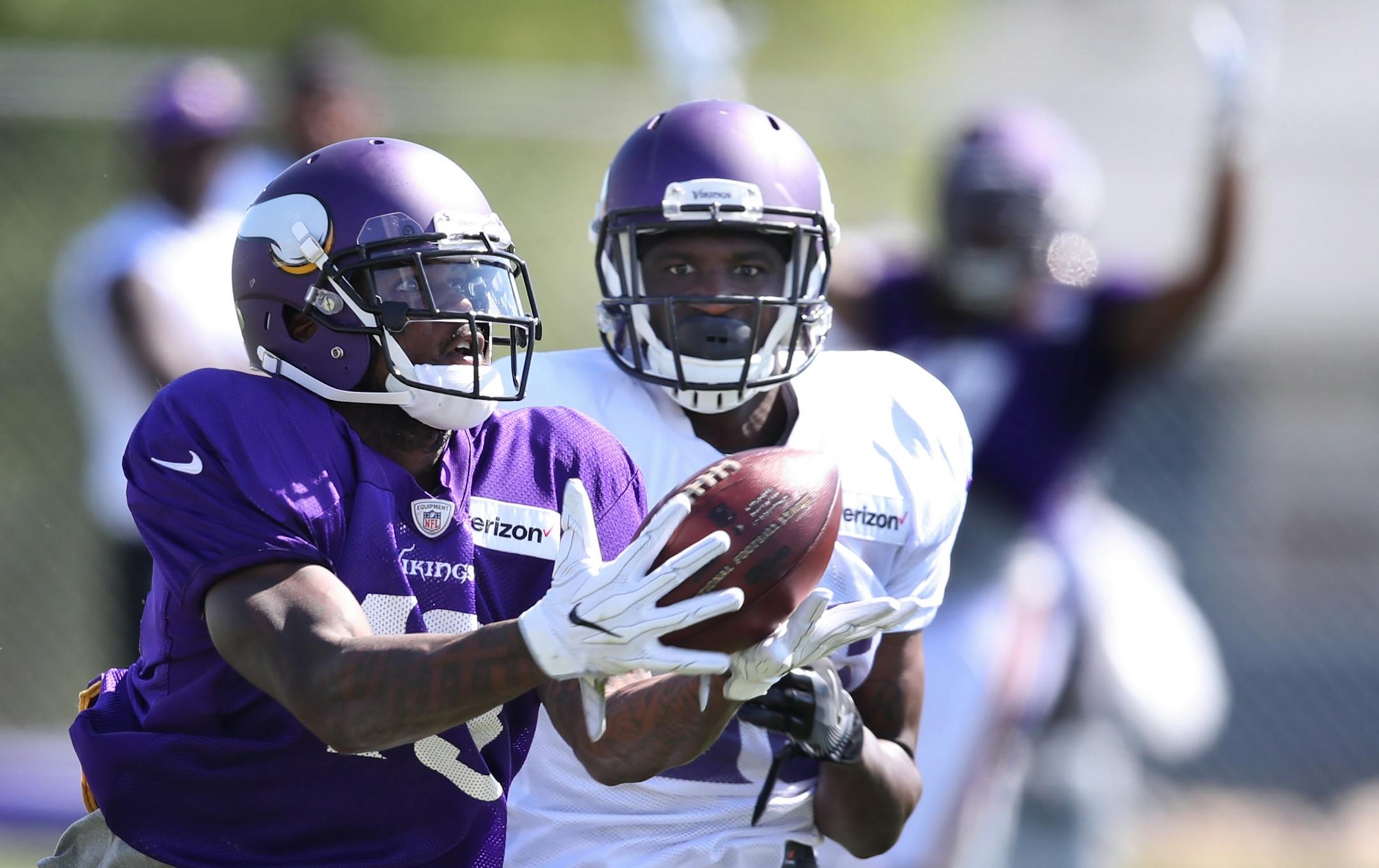 Minnesota Vikings wide receiver Stacy Coley (13) caught a pass over defensive back Tre Roberson (36) during practice at Minnesota State University Mankato Saturday July 29, 2017 in Mankato , MN.