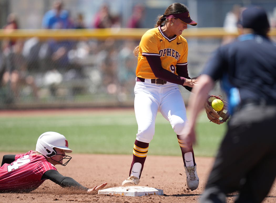 Jess Oakland (9) has been a dependable defender at shortstop for the Gophers, too.