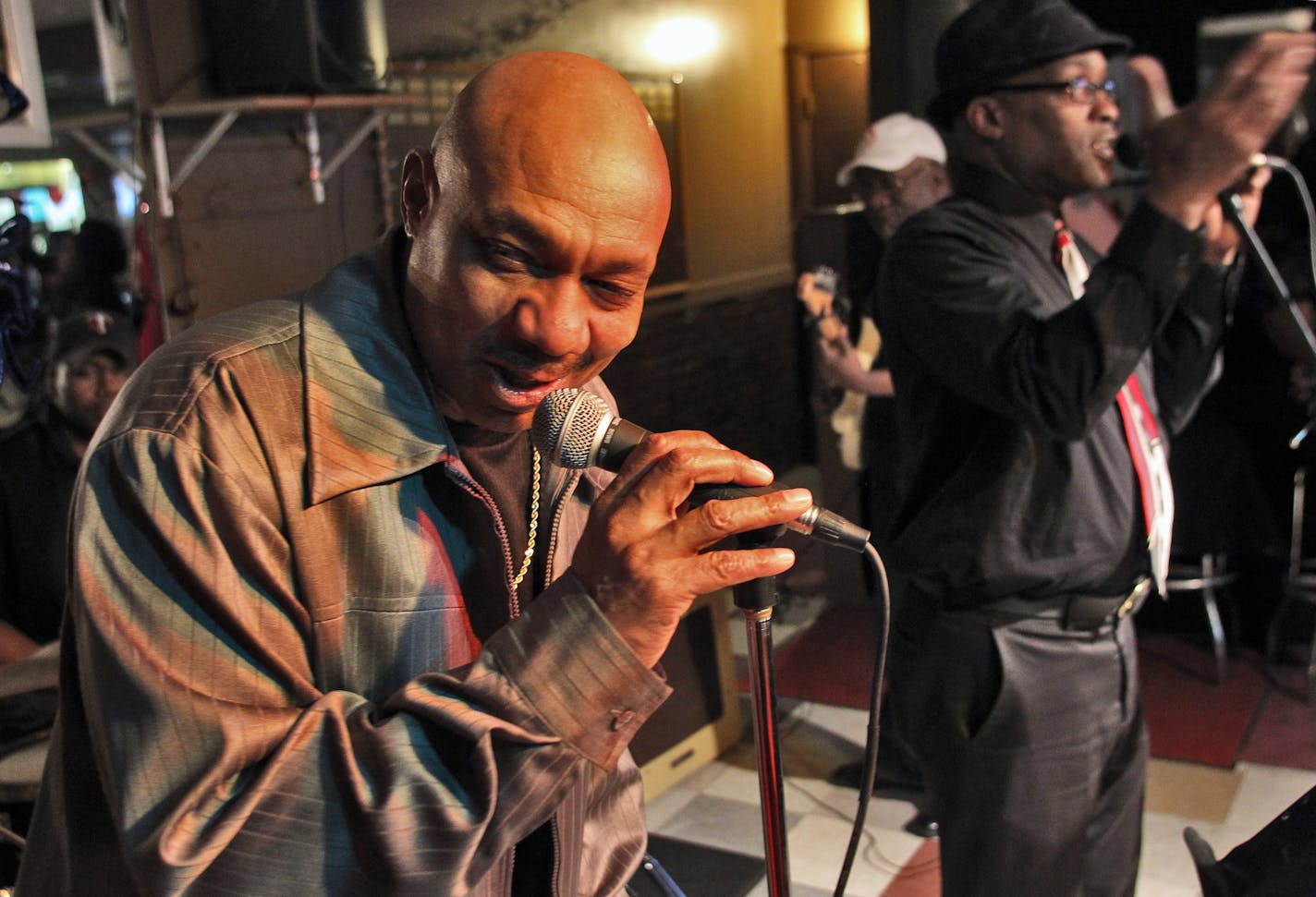 Pierre Lewis, left, makes a point of returning home from Commodores tours to play every Sunday at the Lux Lounge in south Minneapolis with the New Experience Band, featuring Allen Hudson III on vocals.