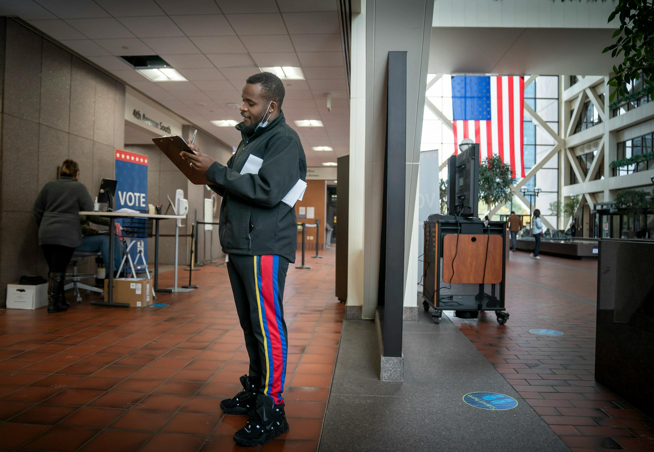 Victor Gaten filled out his ballot application Wednesday at the Hennepin County Government Center. ] GLEN STUBBE • glen.stubbe@startribune.com Wednesday, October 21, 2020 Voting data analyzed by the Star Tribune finds voter turnout in the precincts with the highest concentration of Black voters dropped from 2012, when Barack Obama easily carried the state, to 2016, when Hillary Clinton nearly lost it. In a presidential election year that also saw a nationwide reckoning over race originate in Min