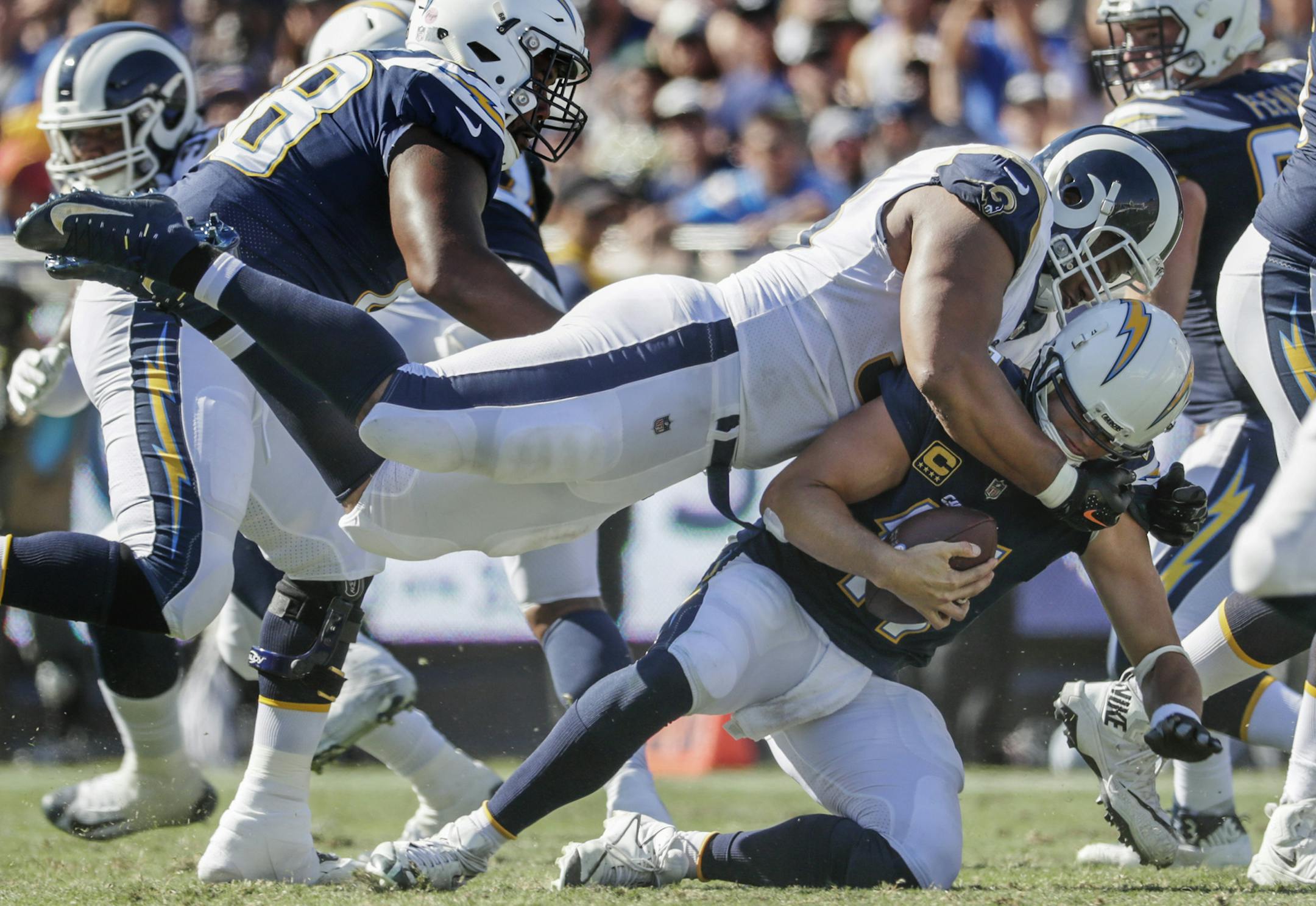 Los Angeles Chargers quarterback Philip Rivers is sacked by Los Angeles Rams defensive lineman Ndamukong Suh during a third quarter drive on Sunday, Sept. 23, 2018 at the Coliseum in Los Angeles, Calif. (Robert Gauthier/Los Angeles Times/TNS) ORG XMIT: 1241089