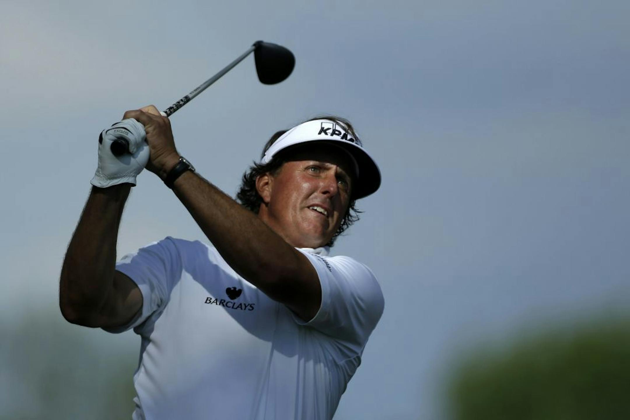 Phil Mickelson tees off on the fifth hole during the second round of the U.S. Open golf tournament at Merion Golf Club, Friday, June 14, 2013, in Ardmore, Pa.