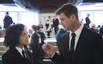 Agent M (Tessa Thompson) and Agent H (Chris Hemsworth) in the lobby of MIB London in Columbia Pictures' MEN IN BLACK: INTERNATIONAL. ORG XMIT: Tessa T