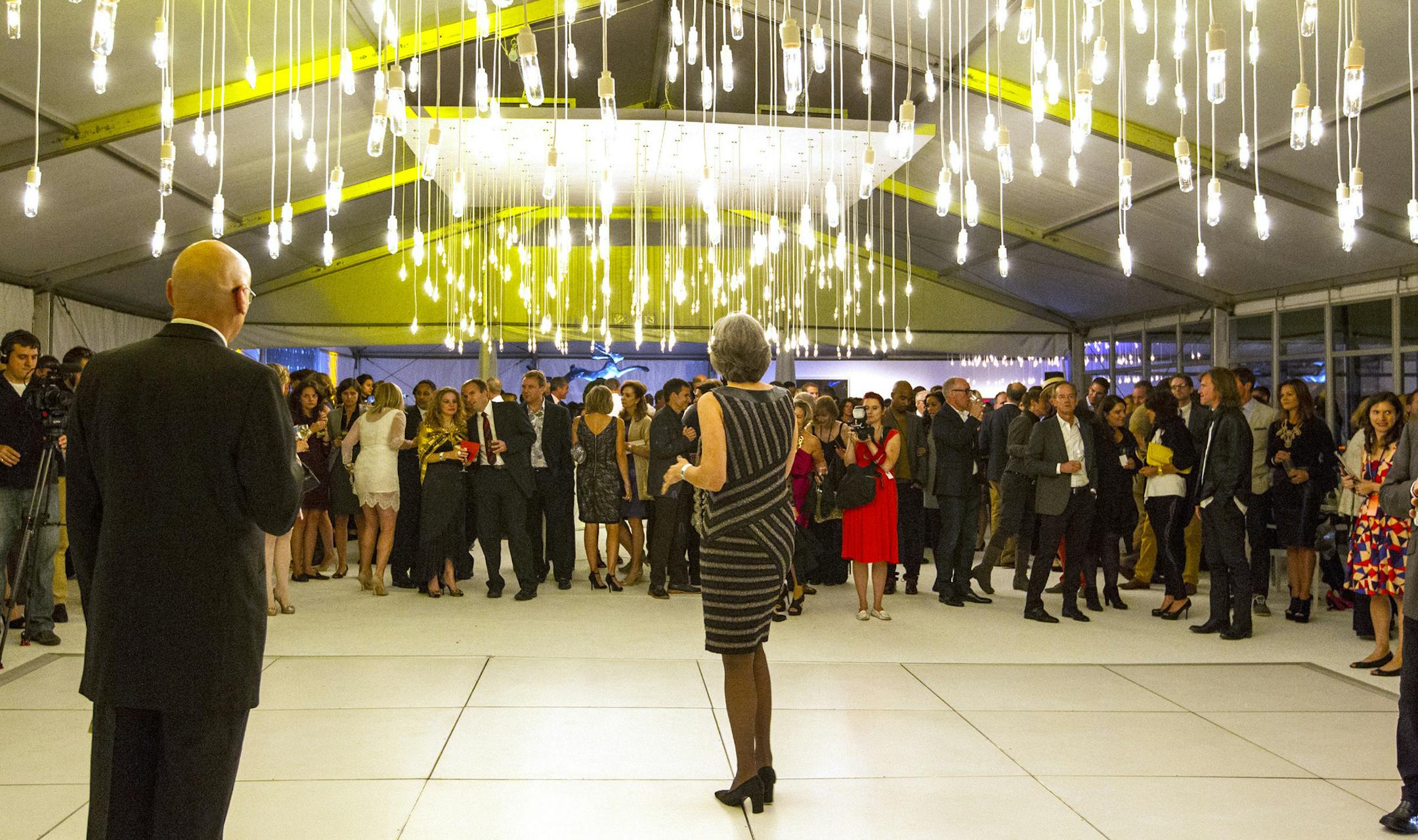 Walker Art Center director Olga Viso welcomes guests to the live auction portion of the evening at Avant Garden at the Walker Art Center September 21, 2013. (Courtney Perry/Special to the Star Tribune) ORG XMIT: MIN1309212149161567