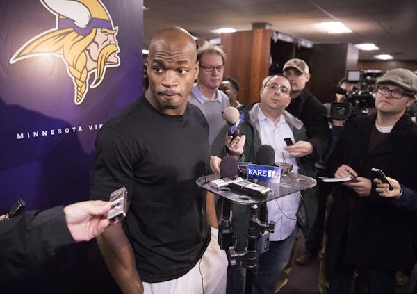 Adrian Peterson speaks to the media as Vikings players pack up their lockers at Winter Park in Eden Prairie on Monday, January 2, 2017 at the end of t