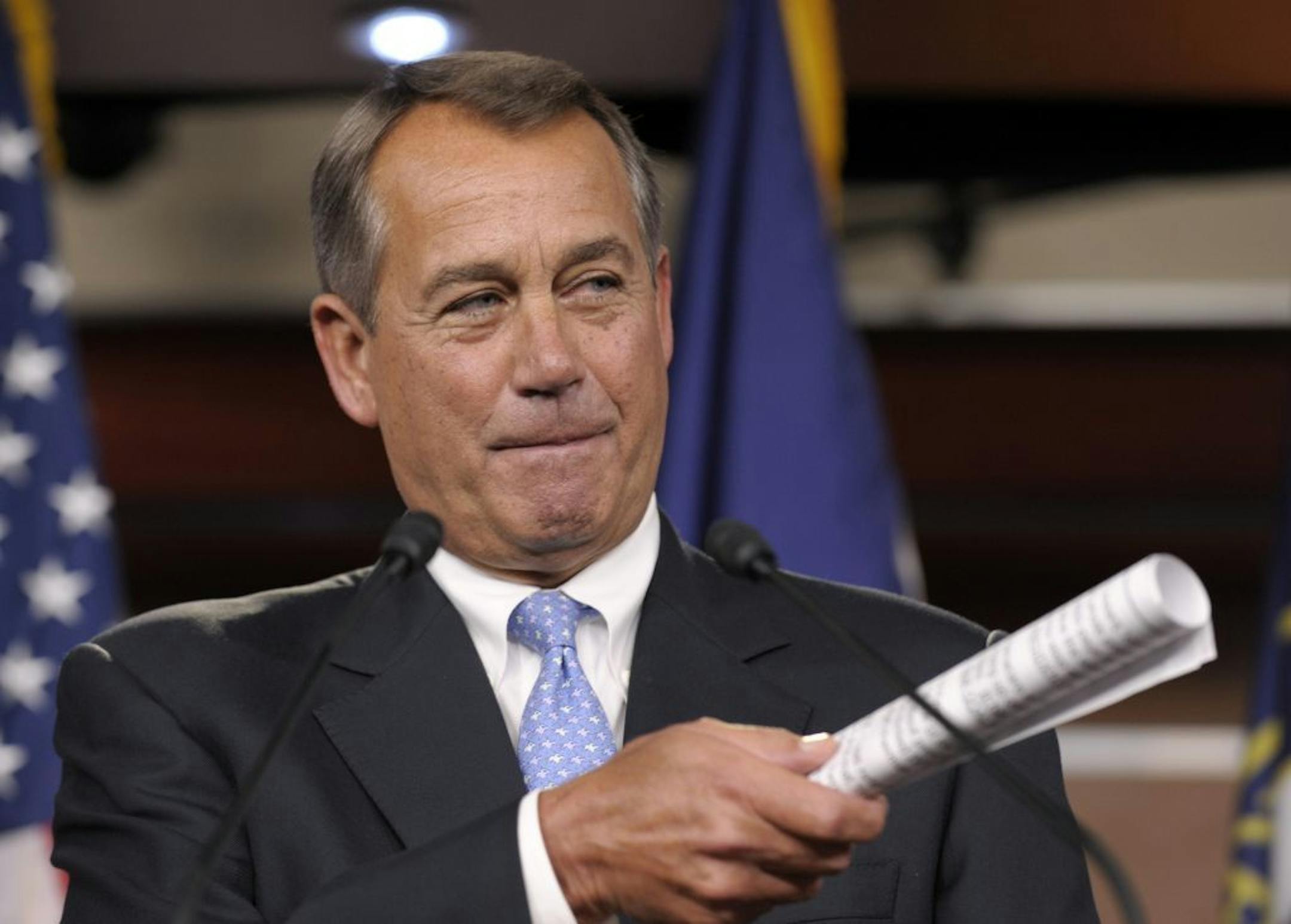 House Speaker John Boehner of Ohio gestures as he speaks to reporters during a news conference on Capitol Hill in Washington, Friday, Nov. 9, 2012. Boehner said any deal to avert the so-called fiscal cliff should include lower tax rates, eliminating special interest loopholes and revising the tax code.