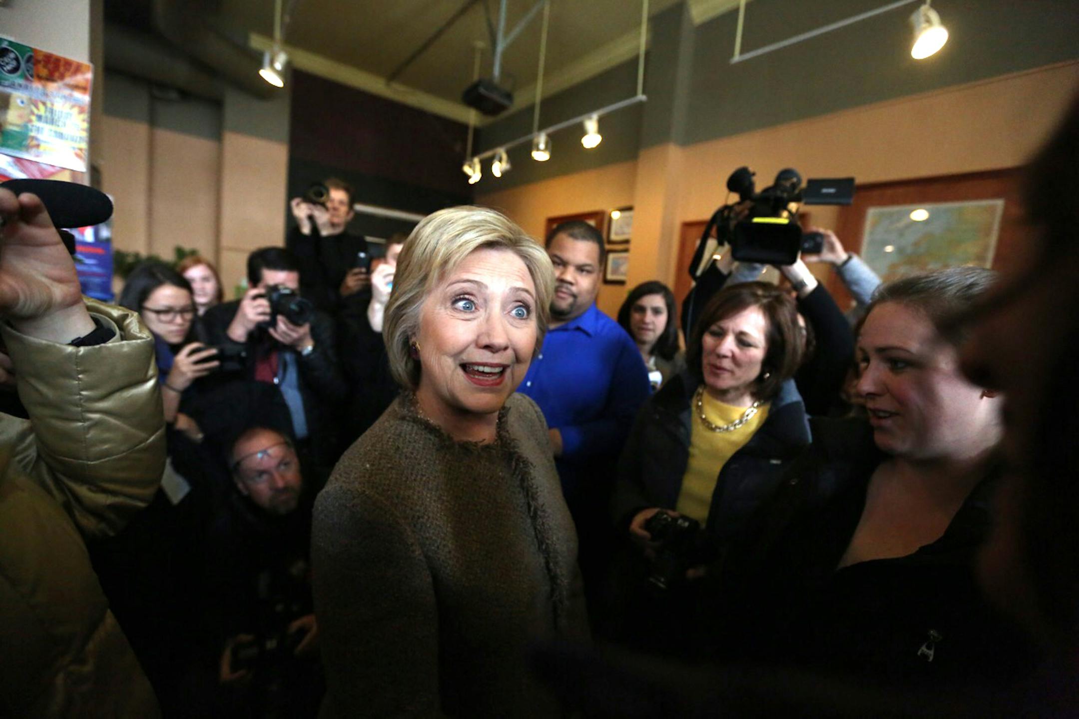 Hillary Clinton greeted supporters at Mapps Coffee Shop in the Cedar-Riverside neighborhood of Minneapolis on her first Twin Cities stop Tuesday.