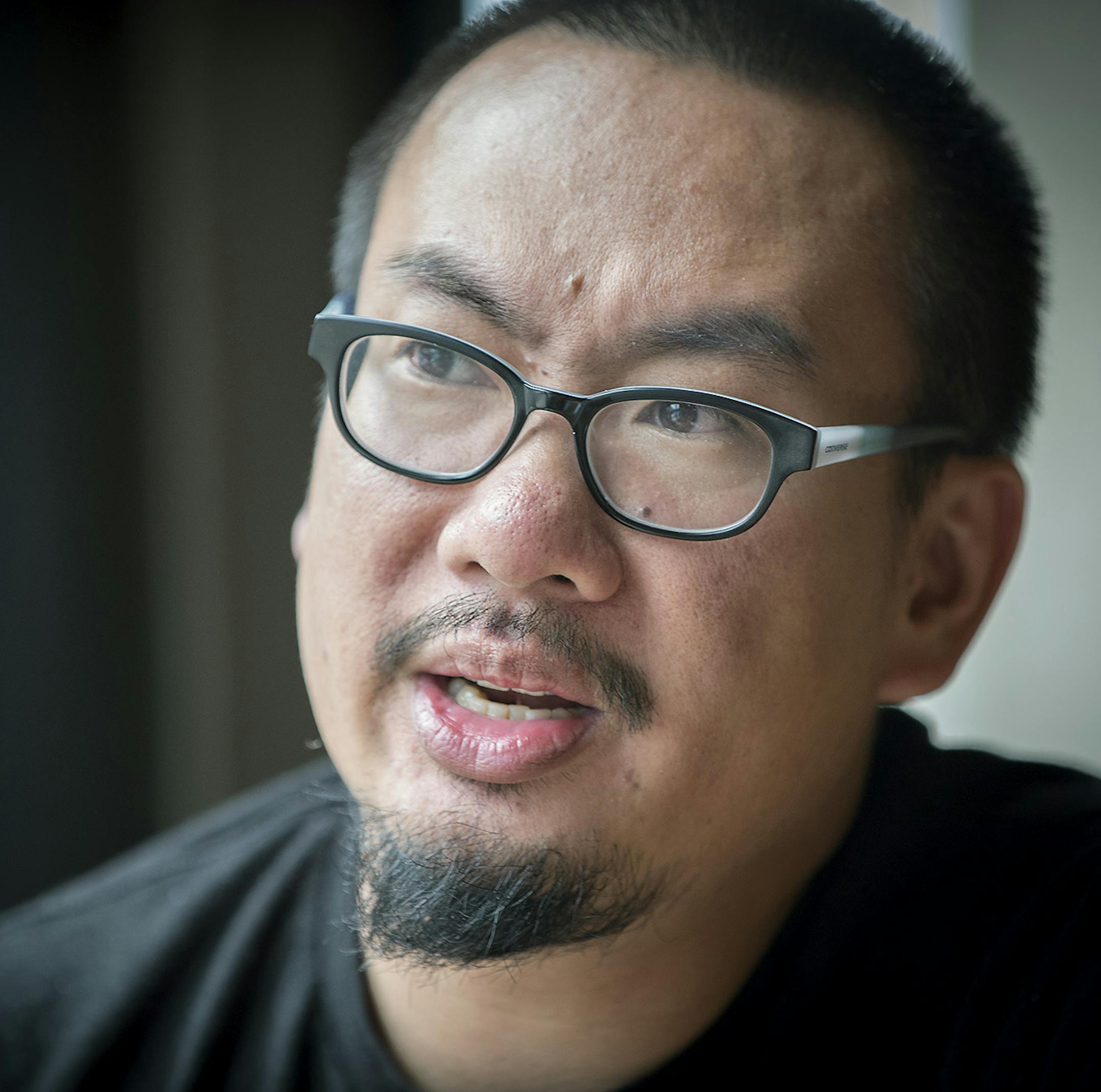 Bao Phi, photographed at The Loft, has a new poetry book out called "Thousand Star Hotel," Tuesday, July 18, 2017 in Minneapolis, MN. ] ELIZABETH FLORES &#x2022; liz.flores@startribune.com