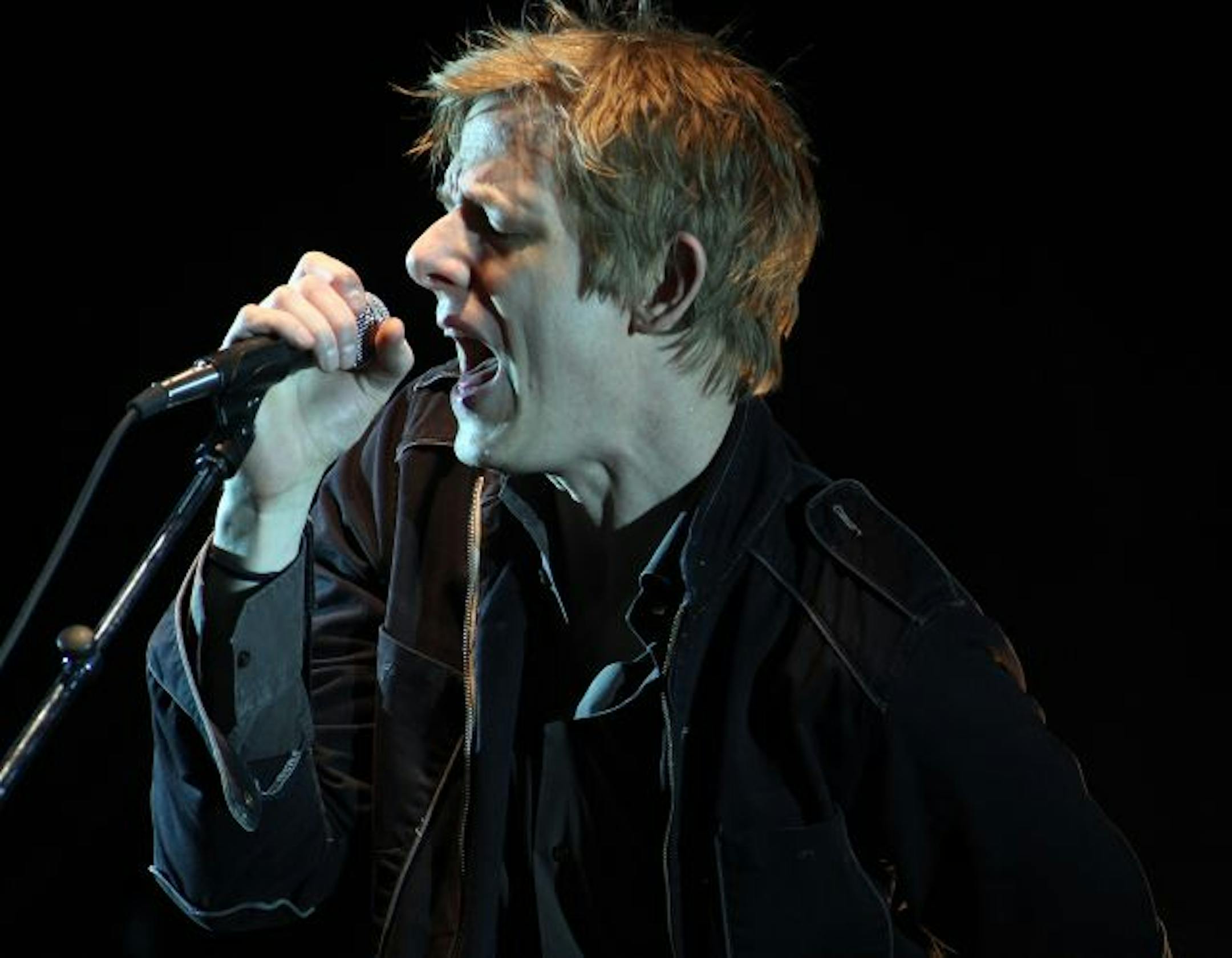 The band Spoon, lead singer/guitarist Britt Daniel, The members of the band include Jim Eno (drums); Rob Pope (bass, backing vocals) and Eric Harvey (keyboard, guitar, percussion, backing vocals).