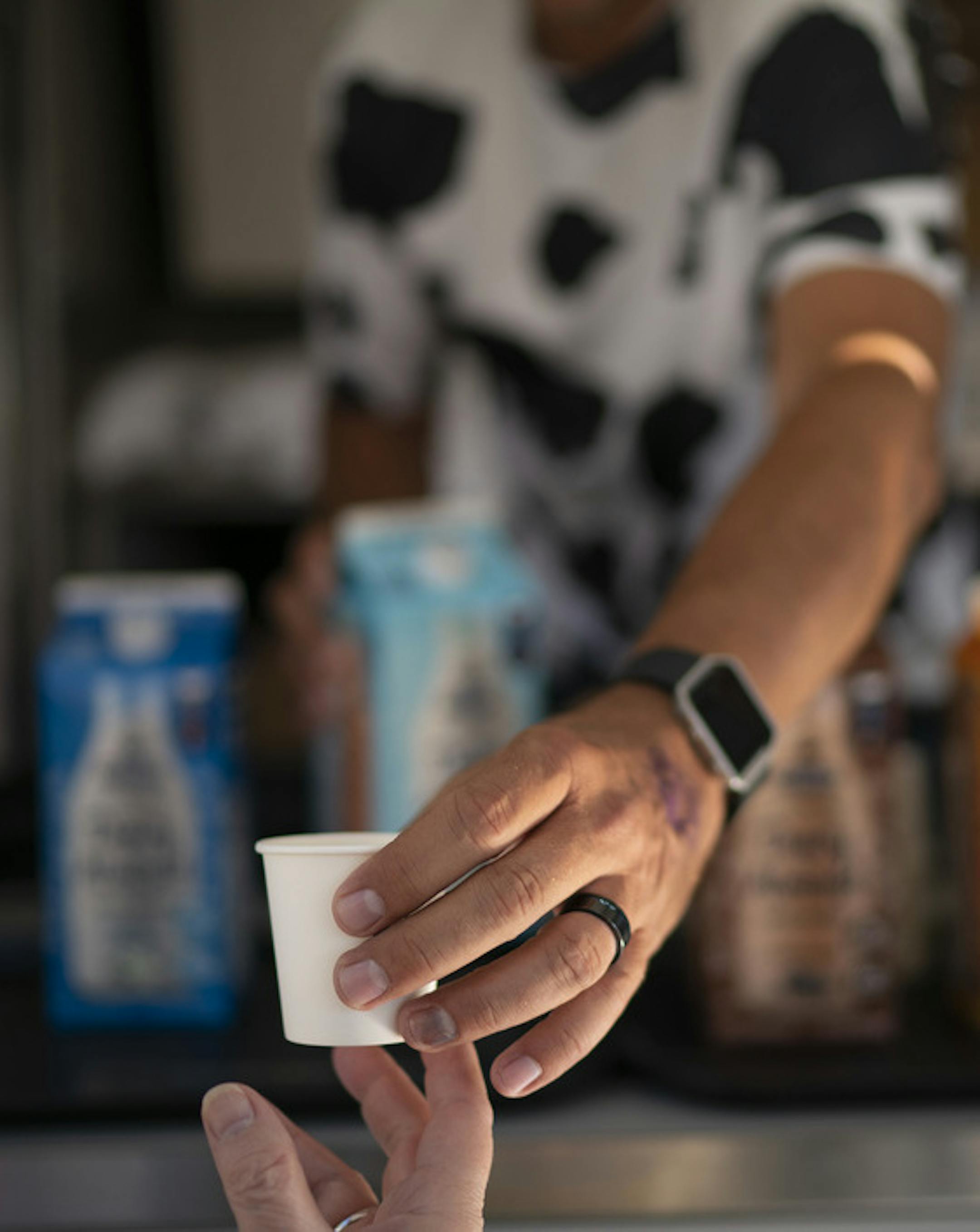 Randy Fricke offered a sample of Dairy + Almond milk blend for a fairgoer. ] JEFF WHEELER • jeff.wheeler@startribune.com Live Real Farms, a 100% farmer owned producer of a first-ever blended milk product that includes both lactose free dairy and plant-based beverages like almond or oat milk is launching the product with free samples and coupons from their stand at the Minnesota State Fair in Falcon Heights. Tyler Hatley was pouring samples for fairgoers Wednesday afternoon, August 28, 201