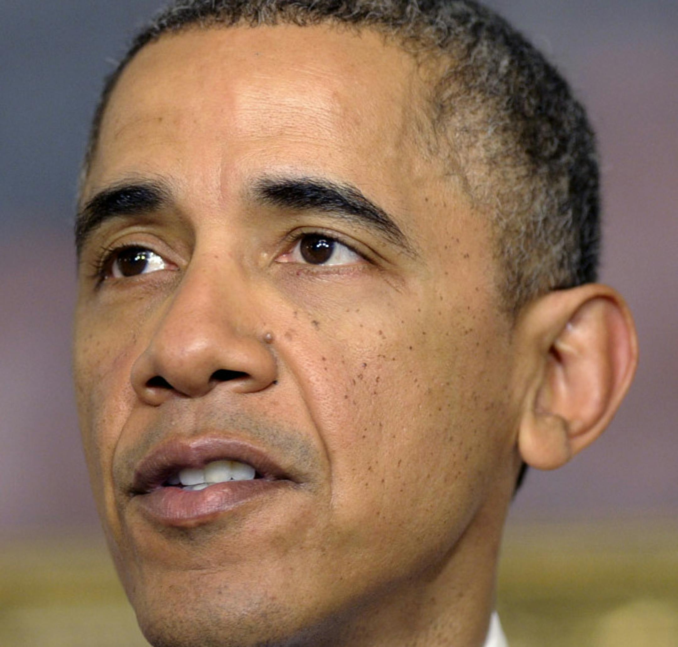 President Barack Obama speaks in the State Dining Room at the White House Saturday, Nov. 23, 2013, in Washington about the nuclear deal between six world powers and Iran that calls on Tehran to limit its nuclear activities in return for sanctions relief. (AP Photo/Susan Walsh) ORG XMIT: MIN2013112321590036
