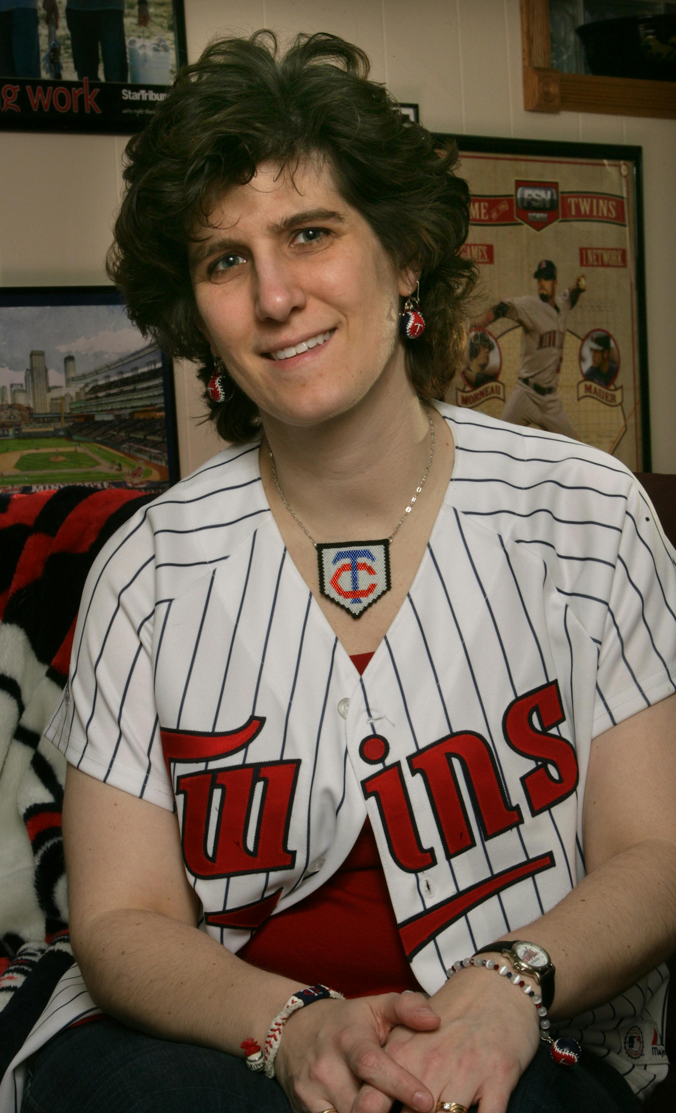 Cindy Hlavka is a "walking Twins shrine," who makes her own beaded Twins jewelry, including her home-plate necklace.