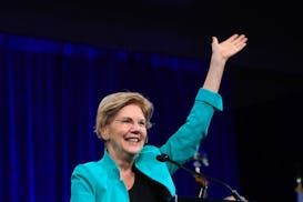 Sen. Elizabeth Warren (D-Mass.) speaks at the summer meeting of the Democratic National Committee in San Francisco on Friday, Aug. 23, 2019. With phon