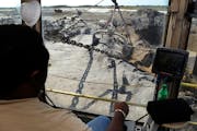 Mosaic Co. operator David Williams works the controls of a phosphate dragline in Tampa, Florida, U.S., on Friday, Dec. 2, 2011. Mosaic Co. is the worl