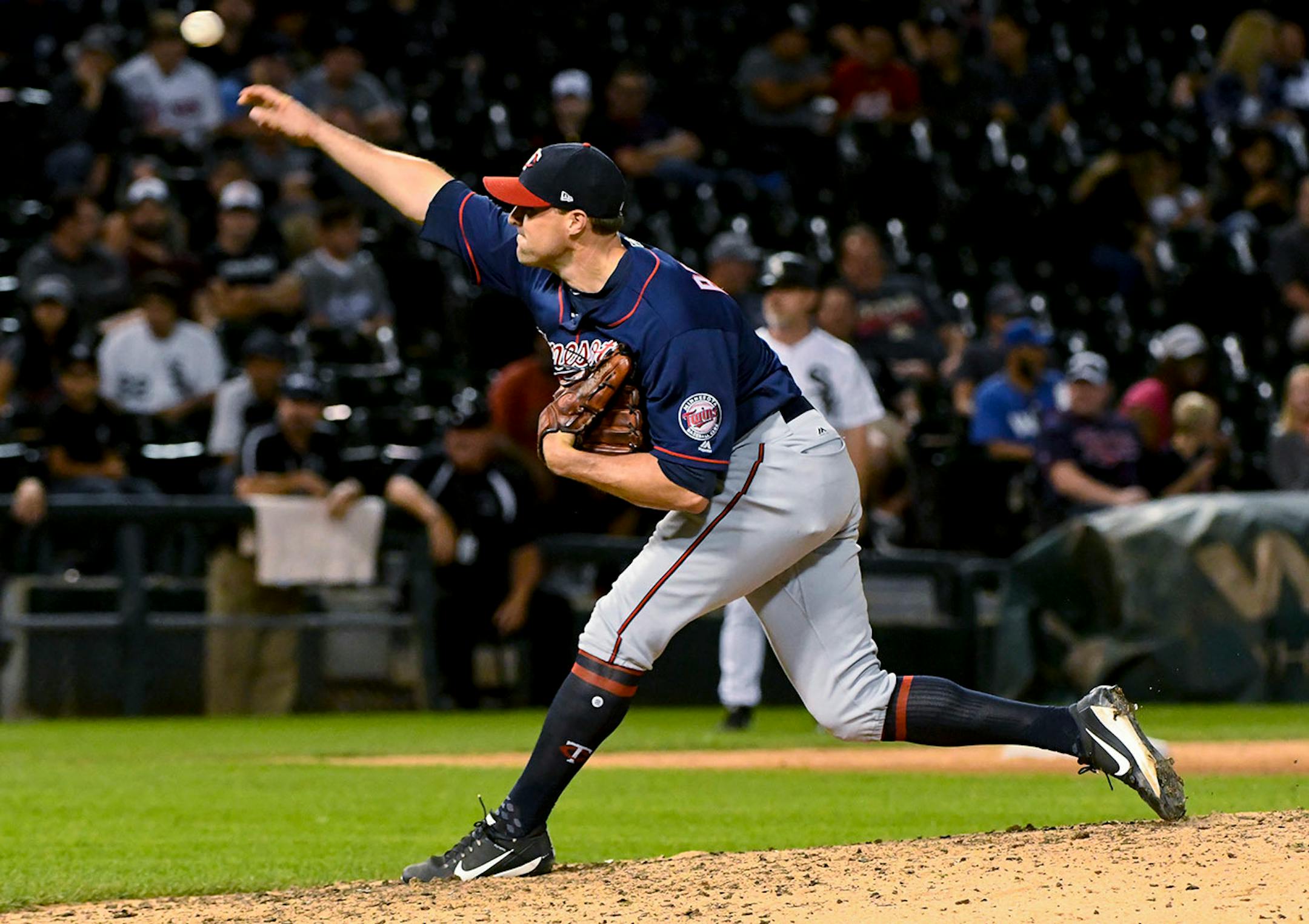 Minnesota Twins relief pitcher Matt Belisle delivers against the Chicago White Sox during the ninth inning of a baseball game in Chicago on Tuesday, Aug. 22, 2017. (AP Photo/Matt Marton)