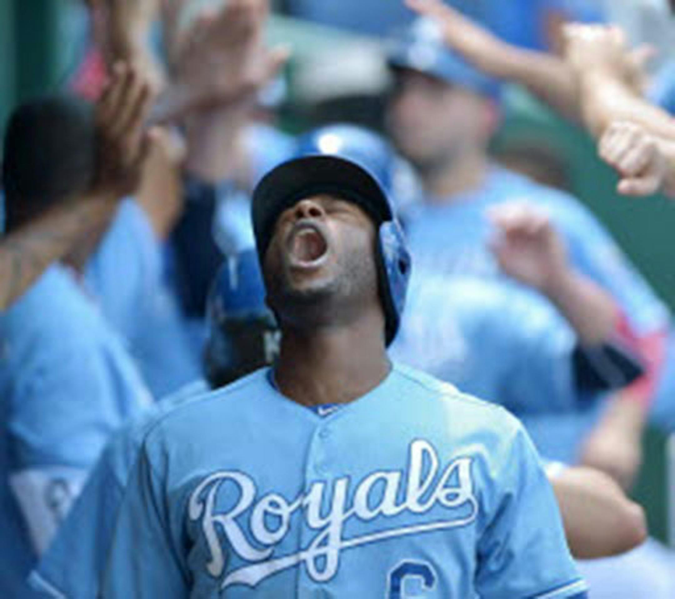 The Royals' Lorenzo Cain celebrated his grand slam with a shout in the sixth inning in Kansas City's 10-7 comeback victory over the Indians on Thursday.
