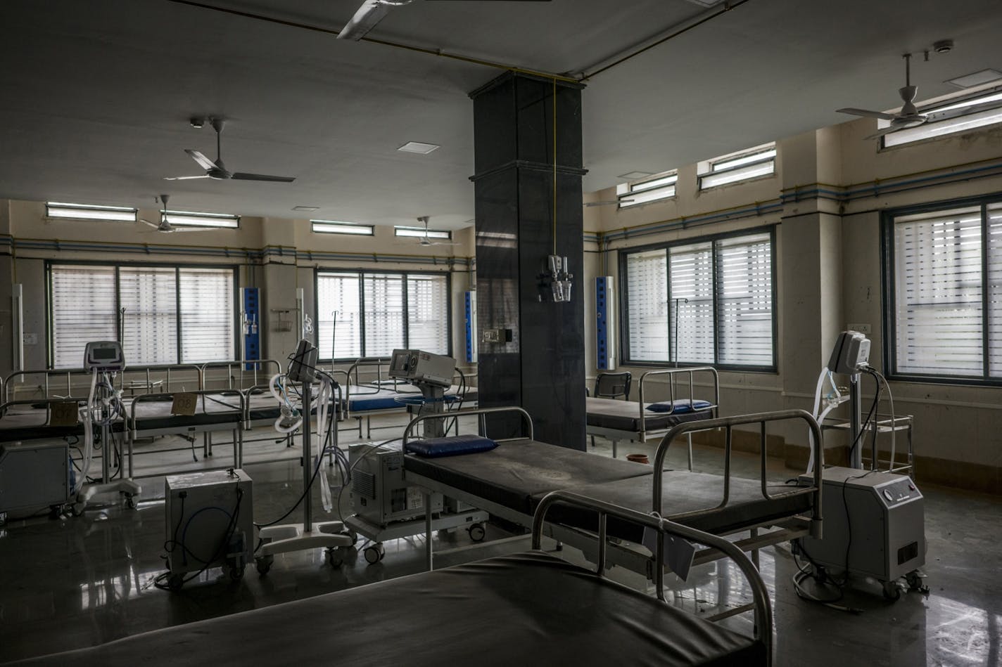 A dust-covered ward at the Amravati Super Speciality Hospital, which treated Covid-19 patients infected by the delta variant during the height of the outbreak there. MUST CREDIT: Bloomberg photo by Anindito Mukherjee.