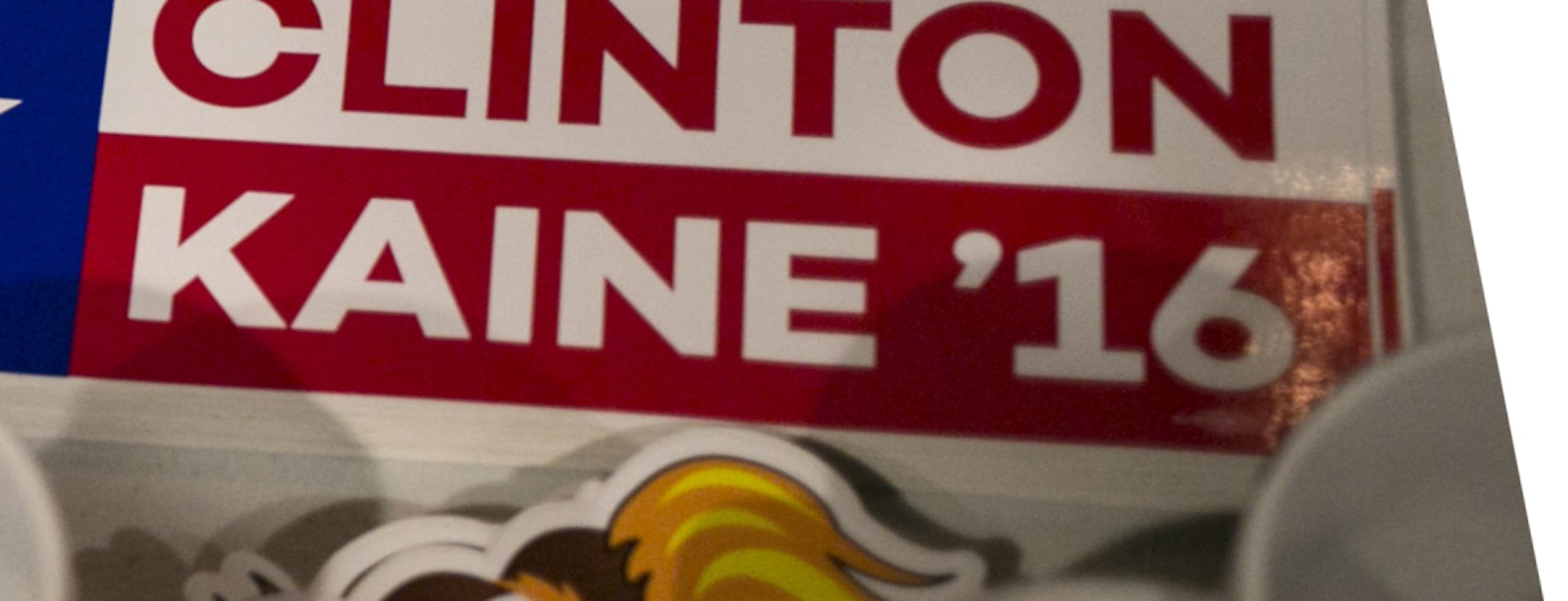 Cards and bumper stickers at a watch party for the first presidential debate between Hillary Clinton and Donald Trump, at Scholz Garten, a German restaurant in Austin, Texas, Sept. 26, 2016. Monday's face-off is among the most highly anticipated presidential debates in American history. (Ilana Panich-Linsman/The New York Times) ORG XMIT: MIN2016100513255449