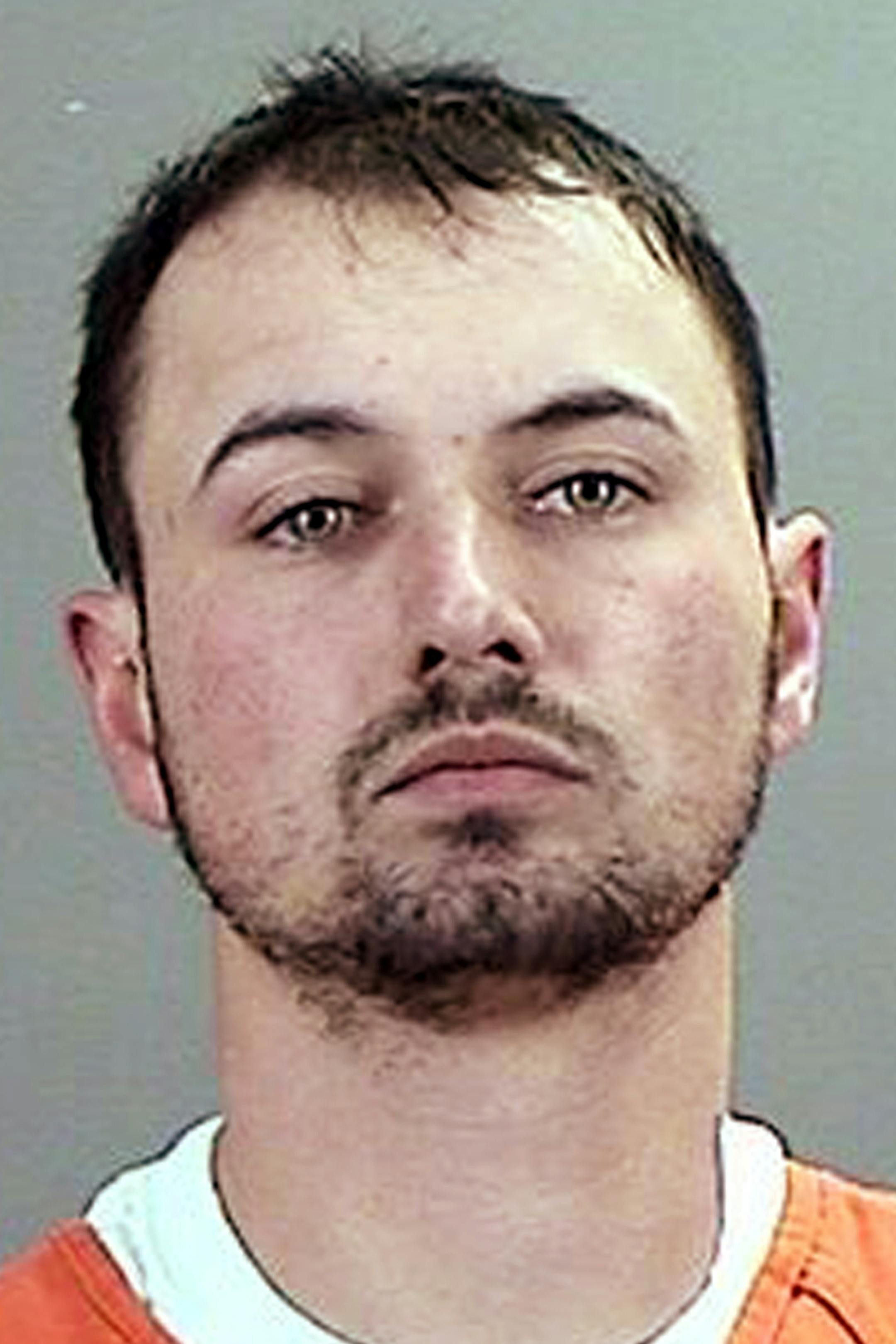 FILE - In this Dec. 11, 2013 file photo provided by the Sherburne County, Minn., Sheriff is Keith Michael Novak. The Iraq War veteran, accused of stealing the identification information of hundreds of members of his former Army unit, is scheduled to appear in court for a detention hearing Monday, Dec. 16, 2013. (AP Photo/Sherburne County Sheriff, File)