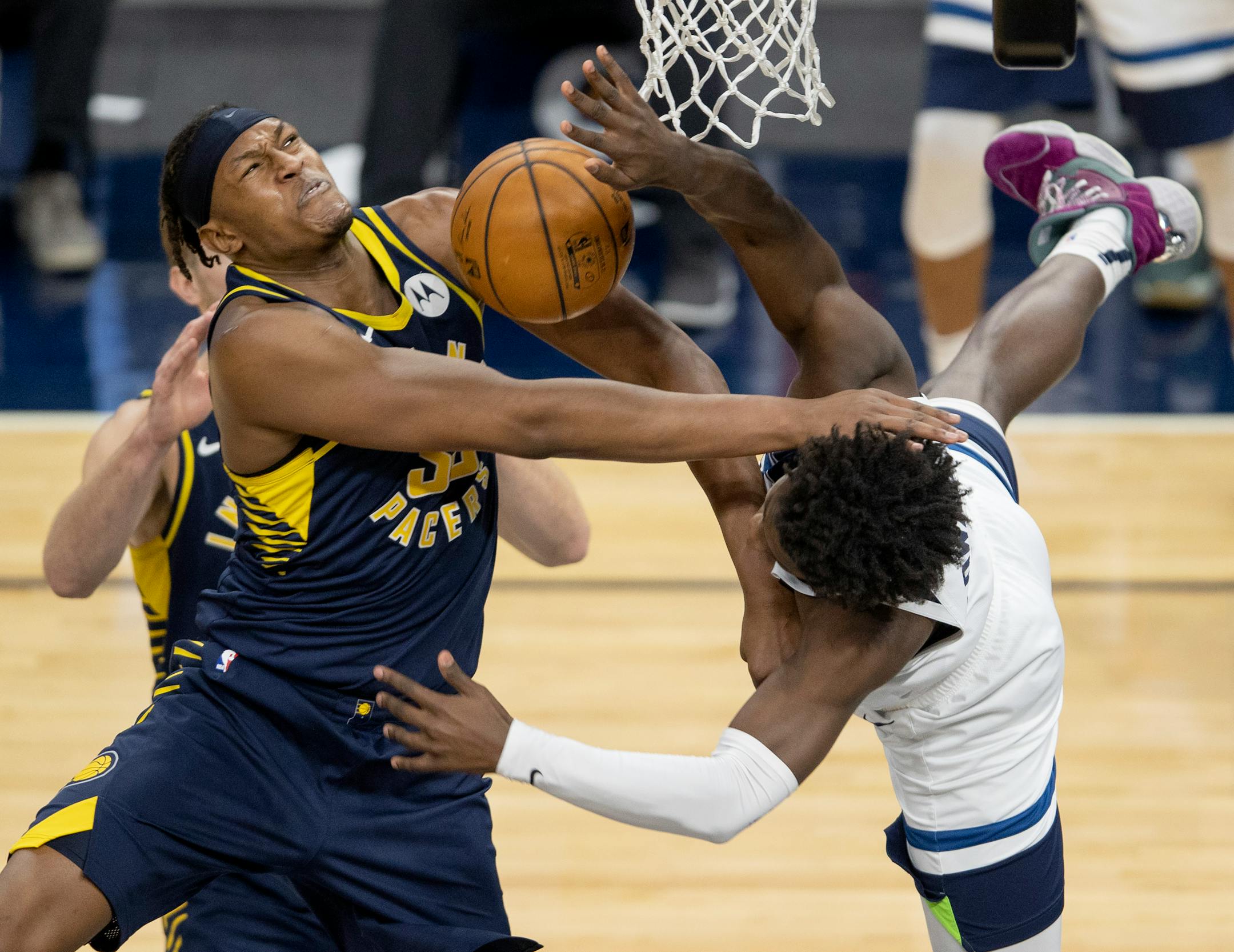 Minnesota Timberwolves Anthony Edwards (1) was fouled by Myles Turner (33) of the Indiana Pacers in the second quarter.