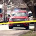 In this image taken from video, emergency personnel work at the scene, Wednesday, March 27, 2024, in Rockford, Ill., where four people were killed and