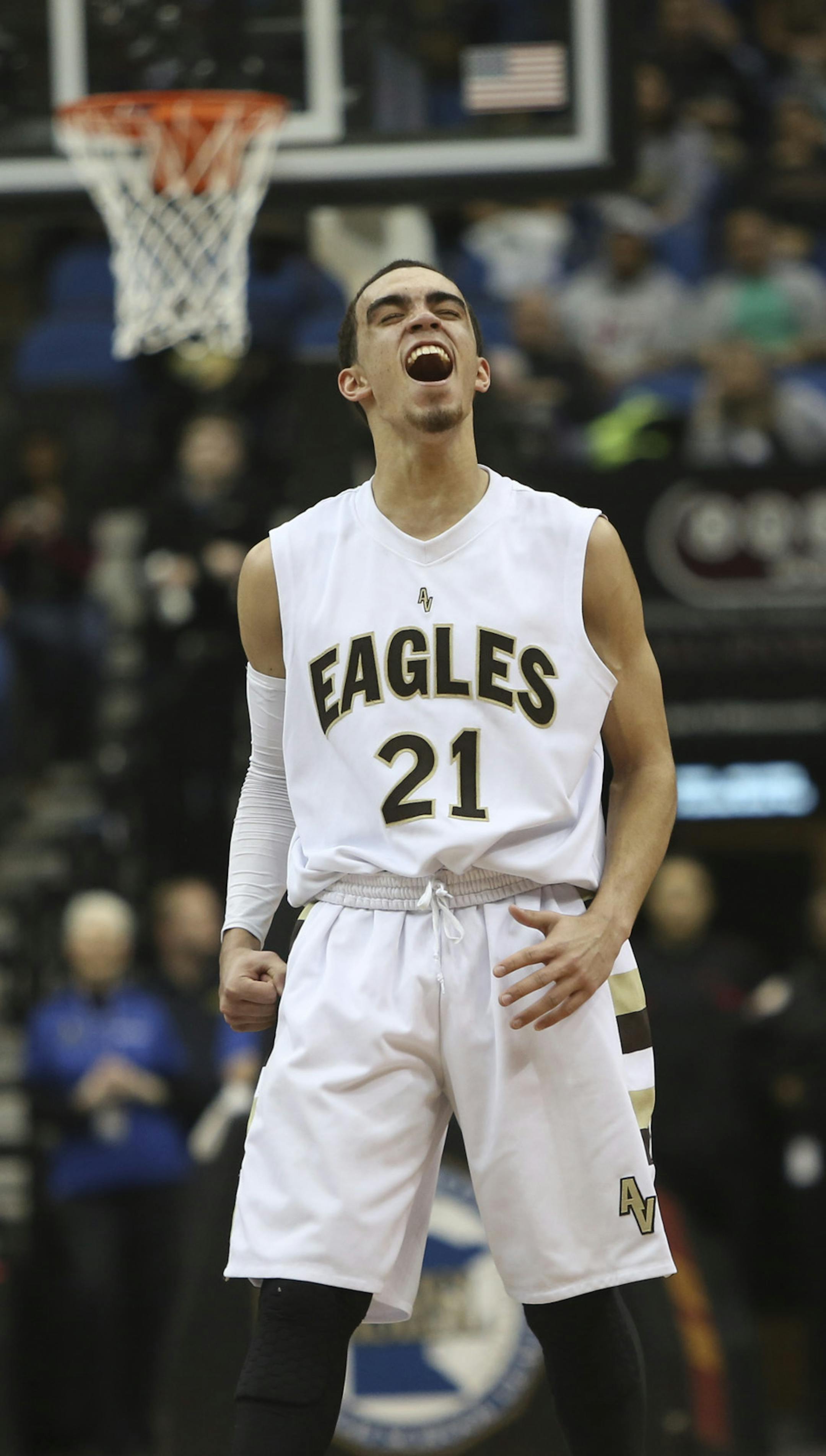 Apple Valley's Tyus Jones celebrated as he was taken out of the game in the class 4A championship at the Target Center in Minneapolis, Min., Saturday, March 23, 2013. Apple Valley won 74-57 over Park Center. ] (KYNDELL HARKNESS/STAR TRIBUNE) kyndell.harkness@startribune.com ORG XMIT: MIN1303232251420002 ORG XMIT: MIN1304162000440950