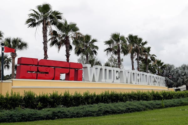 A sign marking the entrance to ESPN's Wide World of Sports at Walt Disney World is seen Wednesday