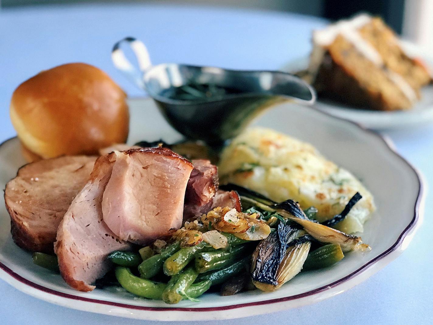 The Lexington's pre-ordered Easter meal includes sliced maple-glazed ham, green beans amandine, scalloped potatoes, mixed green salad, dinner rolls and carrot cake.