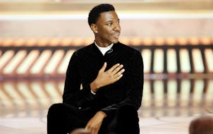 This image released by NBC shows host Jerrod Carmichael during his monologue at the 80th Annual Golden Globe Awards held at the Beverly Hilton Hotel o