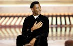 This image released by NBC shows host Jerrod Carmichael during his monologue at the 80th Annual Golden Globe Awards held at the Beverly Hilton Hotel o