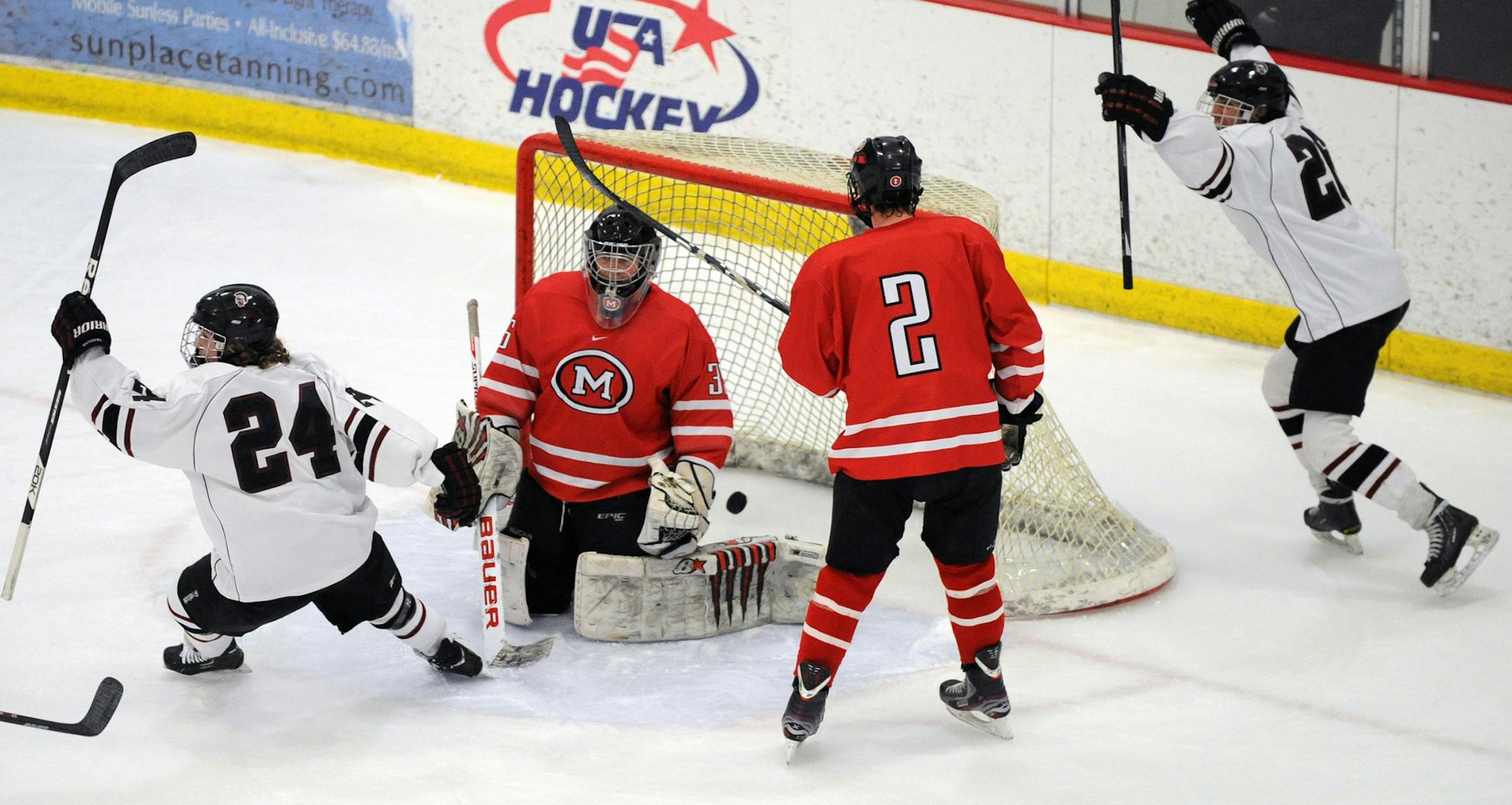 New Prague celebrates a goal during a 3-2 Section 1A championship victory vs. Mankato West. Seth Kriha (24) and Auggie Isaacson (26) Photo: Loren Nelson